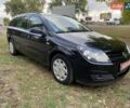 Черный Опель Астра, объемом двигателя 1.6 л и пробегом 197 тыс. км за 5500 $, фото 4 на Automoto.ua