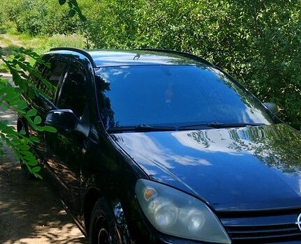 Черный Опель Астра, объемом двигателя 1.6 л и пробегом 283 тыс. км за 4400 $, фото 1 на Automoto.ua