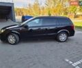 Черный Опель Астра, объемом двигателя 1.4 л и пробегом 214 тыс. км за 4400 $, фото 6 на Automoto.ua