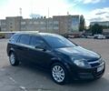 Черный Опель Астра, объемом двигателя 1.6 л и пробегом 285 тыс. км за 5700 $, фото 1 на Automoto.ua