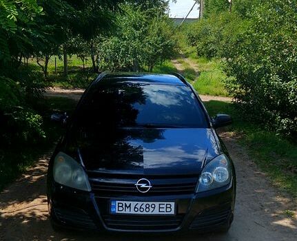 Черный Опель Астра, объемом двигателя 1.6 л и пробегом 283 тыс. км за 4400 $, фото 2 на Automoto.ua