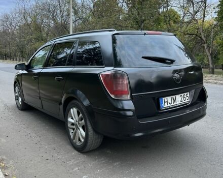 Черный Опель Астра, объемом двигателя 1.9 л и пробегом 333 тыс. км за 2600 $, фото 2 на Automoto.ua