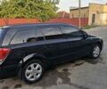 Черный Опель Астра, объемом двигателя 1.6 л и пробегом 270 тыс. км за 4900 $, фото 12 на Automoto.ua