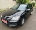 Черный Опель Астра, объемом двигателя 1.6 л и пробегом 219 тыс. км за 4999 $, фото 1 на Automoto.ua