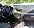 Черный Опель Астра, объемом двигателя 1.6 л и пробегом 214 тыс. км за 4650 $, фото 1 на Automoto.ua
