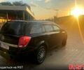 Черный Опель Астра, объемом двигателя 1.7 л и пробегом 310 тыс. км за 4650 $, фото 2 на Automoto.ua