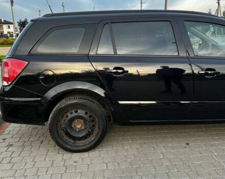 Черный Опель Астра, объемом двигателя 1.9 л и пробегом 296 тыс. км за 2000 $, фото 7 на Automoto.ua