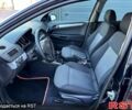 Черный Опель Астра, объемом двигателя 1.6 л и пробегом 230 тыс. км за 5400 $, фото 5 на Automoto.ua