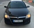 Черный Опель Астра, объемом двигателя 1.6 л и пробегом 260 тыс. км за 3899 $, фото 1 на Automoto.ua