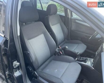 Черный Опель Астра, объемом двигателя 1.7 л и пробегом 240 тыс. км за 3500 $, фото 7 на Automoto.ua