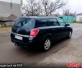 Черный Опель Астра, объемом двигателя 1.7 л и пробегом 320 тыс. км за 3250 $, фото 1 на Automoto.ua