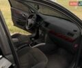 Черный Опель Астра, объемом двигателя 1.6 л и пробегом 241 тыс. км за 4550 $, фото 11 на Automoto.ua