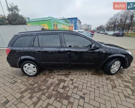 Черный Опель Астра, объемом двигателя 1.6 л и пробегом 229 тыс. км за 5400 $, фото 20 на Automoto.ua