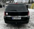 Черный Опель Астра, объемом двигателя 1.9 л и пробегом 311 тыс. км за 4600 $, фото 3 на Automoto.ua