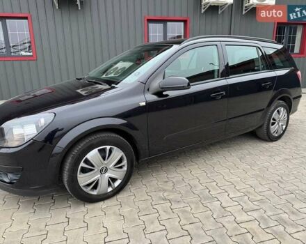 Черный Опель Астра, объемом двигателя 1.6 л и пробегом 229 тыс. км за 4900 $, фото 1 на Automoto.ua