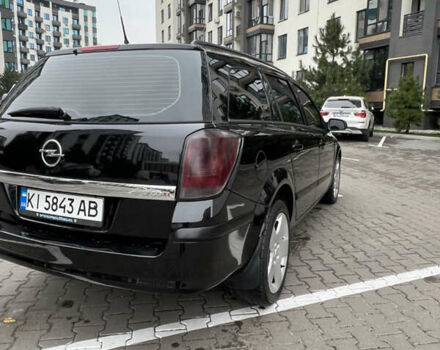 Черный Опель Астра, объемом двигателя 1.7 л и пробегом 330 тыс. км за 5200 $, фото 11 на Automoto.ua