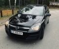 Черный Опель Астра, объемом двигателя 1.6 л и пробегом 234 тыс. км за 4698 $, фото 1 на Automoto.ua