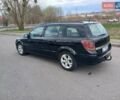Черный Опель Астра, объемом двигателя 1.9 л и пробегом 312 тыс. км за 4200 $, фото 4 на Automoto.ua