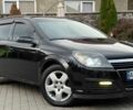 Черный Опель Астра, объемом двигателя 1.25 л и пробегом 257 тыс. км за 3750 $, фото 1 на Automoto.ua