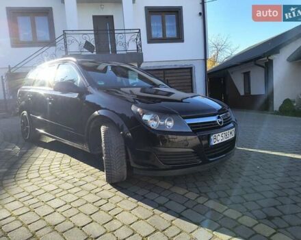 Черный Опель Астра, объемом двигателя 1.8 л и пробегом 245 тыс. км за 4900 $, фото 6 на Automoto.ua