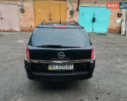 Черный Опель Астра, объемом двигателя 1.3 л и пробегом 163 тыс. км за 4900 $, фото 1 на Automoto.ua