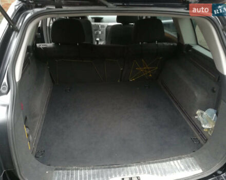 Черный Опель Астра, объемом двигателя 1.3 л и пробегом 163 тыс. км за 4900 $, фото 4 на Automoto.ua