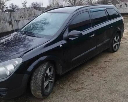 Черный Опель Астра, объемом двигателя 1.2 л и пробегом 340 тыс. км за 3200 $, фото 1 на Automoto.ua