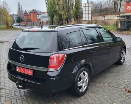 Черный Опель Астра, объемом двигателя 1.8 л и пробегом 165 тыс. км за 5650 $, фото 19 на Automoto.ua