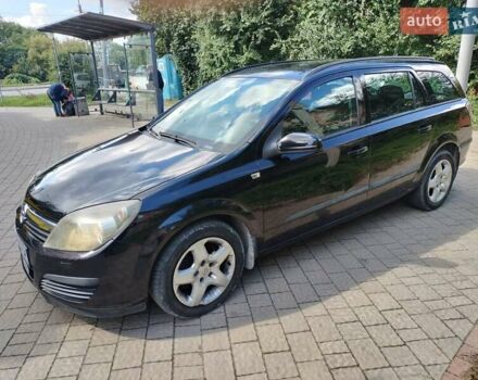 Черный Опель Астра, объемом двигателя 1.3 л и пробегом 268 тыс. км за 4550 $, фото 2 на Automoto.ua