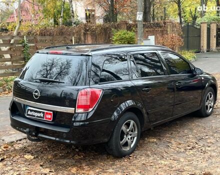 Черный Опель Астра, объемом двигателя 1.6 л и пробегом 340 тыс. км за 5140 $, фото 11 на Automoto.ua