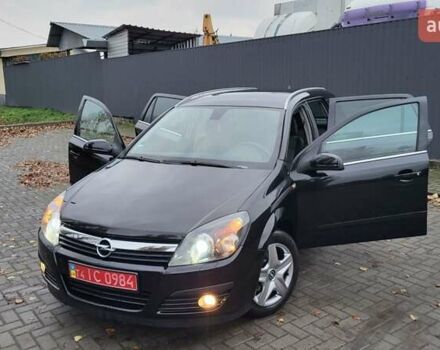 Черный Опель Астра, объемом двигателя 1.8 л и пробегом 165 тыс. км за 5650 $, фото 20 на Automoto.ua