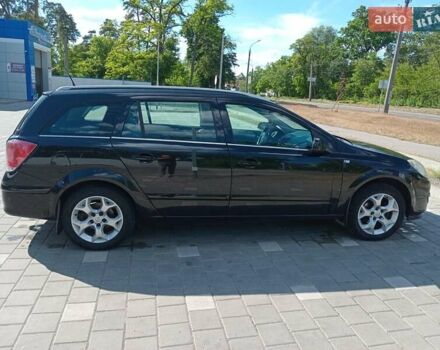 Черный Опель Астра, объемом двигателя 1.8 л и пробегом 289 тыс. км за 6200 $, фото 2 на Automoto.ua