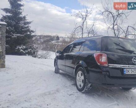 Черный Опель Астра, объемом двигателя 1.9 л и пробегом 236 тыс. км за 4700 $, фото 5 на Automoto.ua
