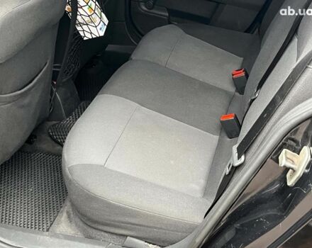 Черный Опель Астра, объемом двигателя 1.6 л и пробегом 340 тыс. км за 5140 $, фото 22 на Automoto.ua