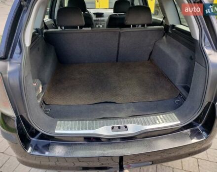 Черный Опель Астра, объемом двигателя 1.3 л и пробегом 268 тыс. км за 4550 $, фото 5 на Automoto.ua