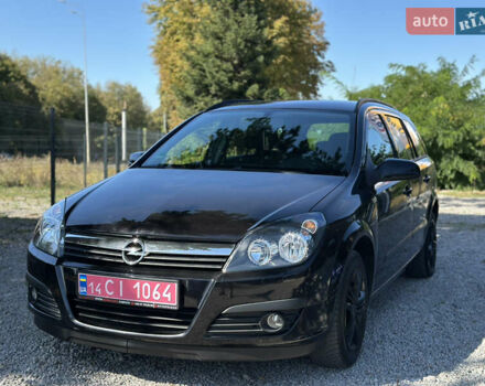 Черный Опель Астра, объемом двигателя 1.6 л и пробегом 241 тыс. км за 5700 $, фото 6 на Automoto.ua
