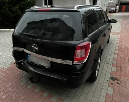 Черный Опель Астра, объемом двигателя 1.9 л и пробегом 311 тыс. км за 2930 $, фото 14 на Automoto.ua