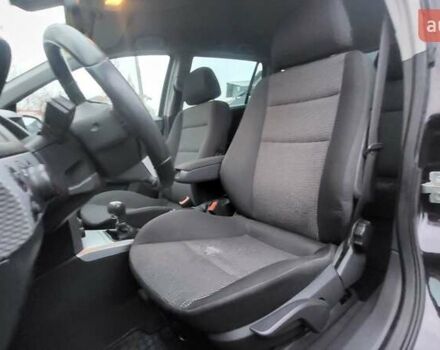 Черный Опель Астра, объемом двигателя 1.8 л и пробегом 165 тыс. км за 5650 $, фото 28 на Automoto.ua