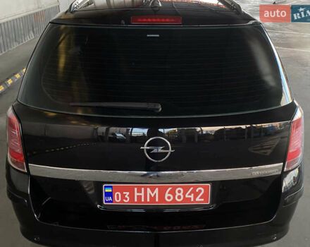 Черный Опель Астра, объемом двигателя 1.6 л и пробегом 207 тыс. км за 4999 $, фото 12 на Automoto.ua