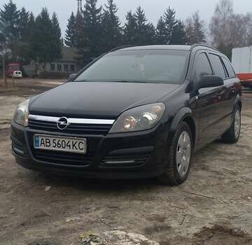 Черный Опель Астра, объемом двигателя 1.8 л и пробегом 260 тыс. км за 5200 $, фото 8 на Automoto.ua