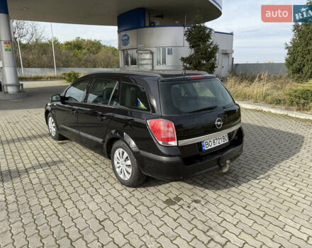 Черный Опель Астра, объемом двигателя 1.69 л и пробегом 420 тыс. км за 5500 $, фото 15 на Automoto.ua