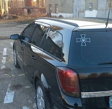 Черный Опель Астра, объемом двигателя 1.8 л и пробегом 260 тыс. км за 5200 $, фото 25 на Automoto.ua