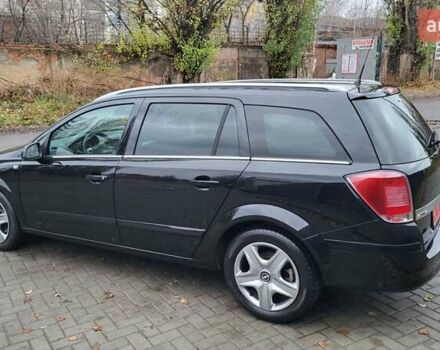 Черный Опель Астра, объемом двигателя 1.8 л и пробегом 165 тыс. км за 5450 $, фото 3 на Automoto.ua