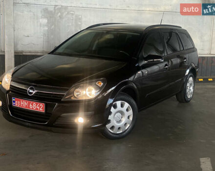 Черный Опель Астра, объемом двигателя 1.6 л и пробегом 207 тыс. км за 4999 $, фото 1 на Automoto.ua