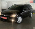 Черный Опель Астра, объемом двигателя 1.6 л и пробегом 207 тыс. км за 4999 $, фото 1 на Automoto.ua