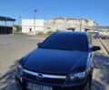 Черный Опель Астра, объемом двигателя 1.7 л и пробегом 340 тыс. км за 4950 $, фото 1 на Automoto.ua