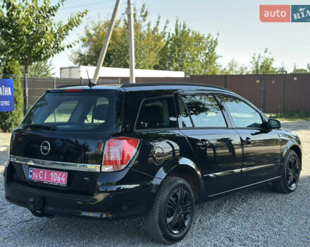 Черный Опель Астра, объемом двигателя 1.6 л и пробегом 241 тыс. км за 5700 $, фото 13 на Automoto.ua