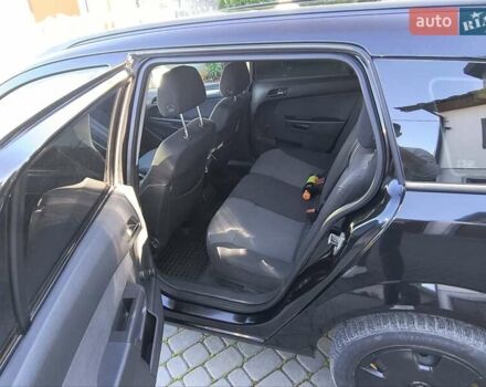 Черный Опель Астра, объемом двигателя 1.8 л и пробегом 245 тыс. км за 4900 $, фото 24 на Automoto.ua