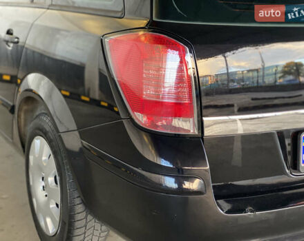 Черный Опель Астра, объемом двигателя 1.6 л и пробегом 207 тыс. км за 4999 $, фото 15 на Automoto.ua
