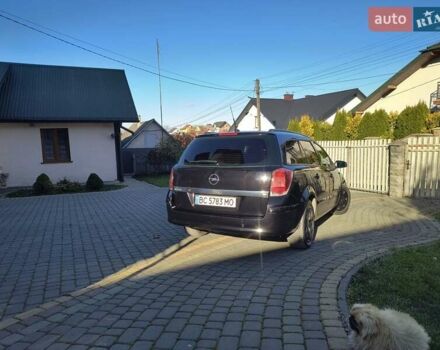 Черный Опель Астра, объемом двигателя 1.8 л и пробегом 245 тыс. км за 4900 $, фото 21 на Automoto.ua